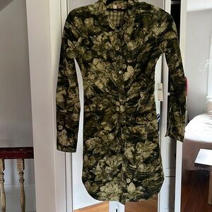 Pilcro dress from Anthropology in size 0. Green dress with cream detail.